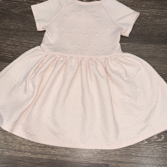 Disney light pink mini dress with a mini patch and bow detail throughout - Picture 2 of 4